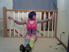 CD Lisa in multiple bondage position (rave outfit)s
