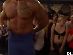 Raucous group sex breaks out during a striptease