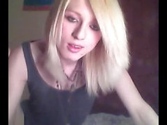 Platinum blonde emo tgirl does a bit of softcore posing