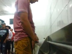 Guys pissing in brazilian music festival