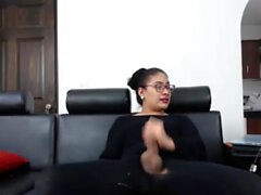 Ebony shemale in stockings in solo masturbation
